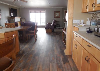 view of the modern kitchen cabinet and the flooring in the house